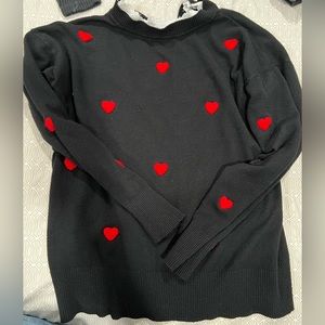 Used heart longsleeve but still in good condition